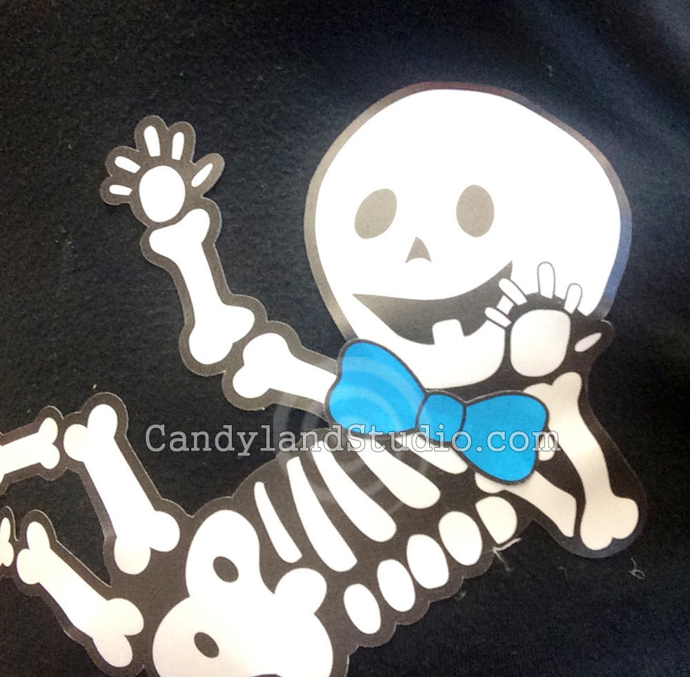 Add a bow tie to your baby skeleton